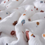 طقم لحاف مواليد قطعتين قطن بلون أوف وايت