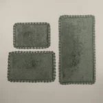 دعاسة حمام بعدة مقاسات باللون الأخضر الغامق